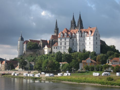 Scenic view of Albrechtsburg Castle towering over the Elbe River in Meißen, Germany. Christmas-in-Saxony-Germany