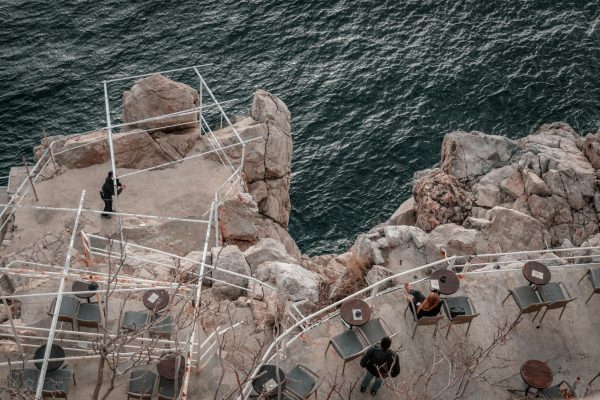 pexels-photo-11828524-11828524 Aerial view of a cliffside café above the Adriatic Sea in Dubrovnik, Croatia.