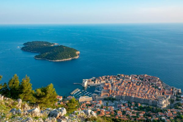 Stunning aerial view of Dubrovnik's Old Town and Adriatic Sea in summer to Lokrum Island. Stunning aerial view of Dubrovnik's Old Town and Adriatic Sea in summer to Lokrum Island.