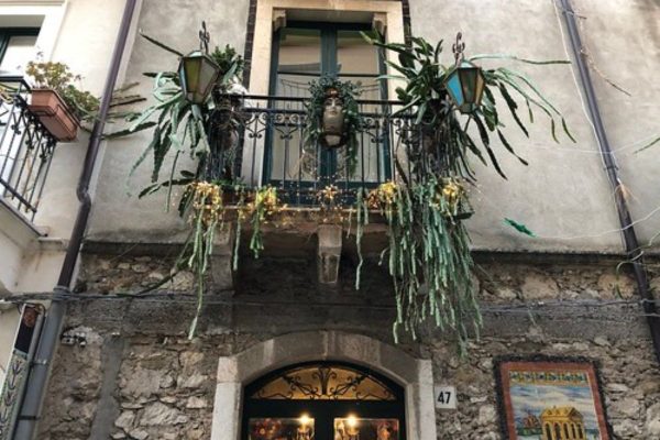 Planning Your Sicily Extended Stay: The Complete Pre-Departure Guide - Taormina Artwork and Plants