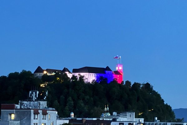 Ljubljana Castle on the day of Uprising Against Occupation , the 27th of April. The castle is lite up in the flag colours of white, blue and red.