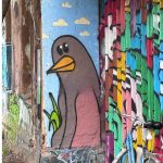 Colourful graffiti of a Pigeon painted on the wall in Metelkova, Ljubljana Solvenia