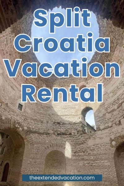 Split Croatia Vacation Rentals_ Which Should You Book_ Split Best Places to Stay: A Pinterest graphic features an upward view inside the ancient domed Vestibule of Diocletian's Palace, its stone and brick walls curving toward a circular opening filled with sky. Bold blue text reading "Split Croatia Vacation Rental" is overlaid on the image, with the website theextendedvacation.com noted at the bottom.